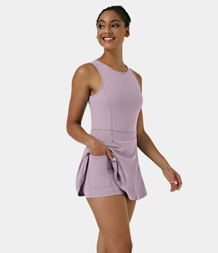 Versatile 2-in-1 pickleball short dress with flare design and built-in shorts, featuring side pockets.