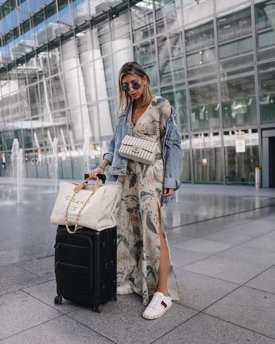 Off-white maxi dress, styled with a denim jacket.
