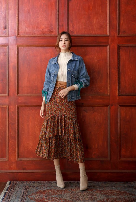 vintage floral skirt paired with a modern denim jacket