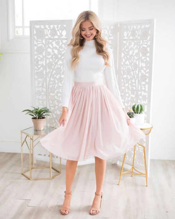 long-sleeved turtleneck top with midi netted skirt