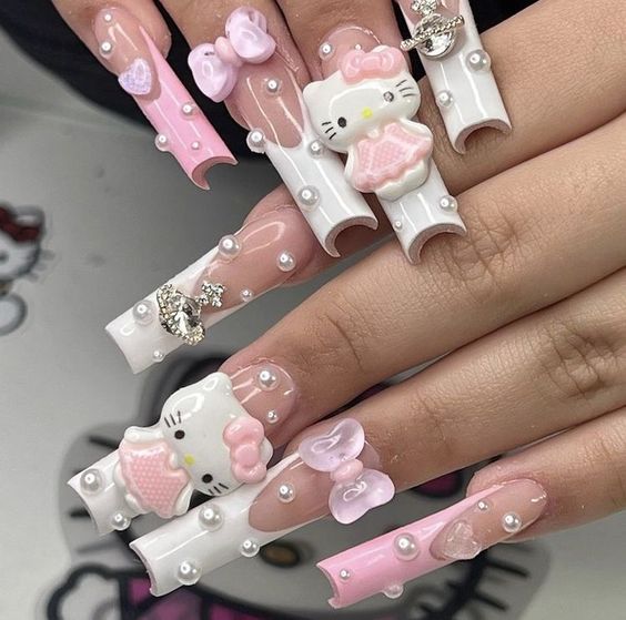 long acrylic hello kitty nails with embellishments and French tip