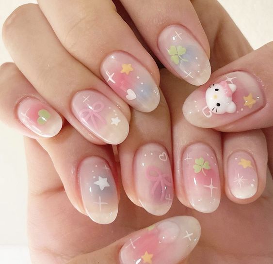 dreamy hello kitty gel manicure with soft pastel base
